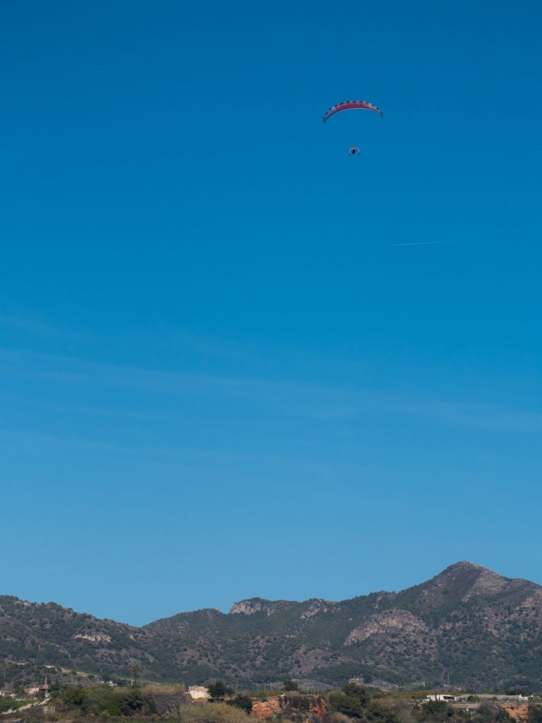 Glider in front of mountains Nerja